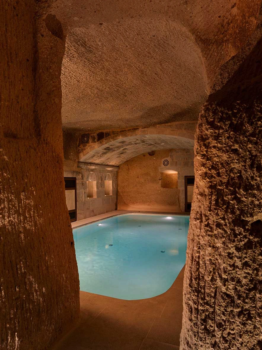 Turquoise water in the cave pool at Argos in Cappadocia